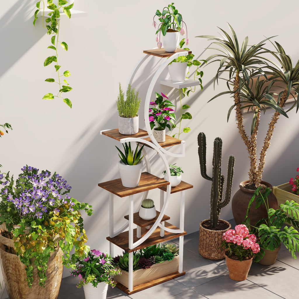 S-shaped eight-tier plant stand styled among cacti, flowers, and trailing greenery