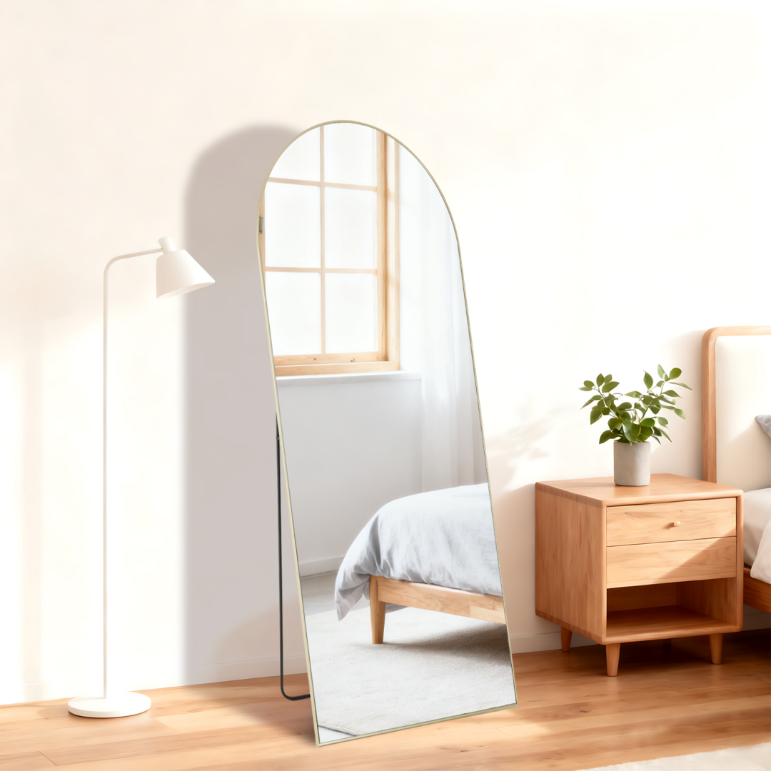 Gold arched full-length mirror