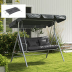 Charcoal tufted bench cushion set on an outdoor swing in a landscaped yard