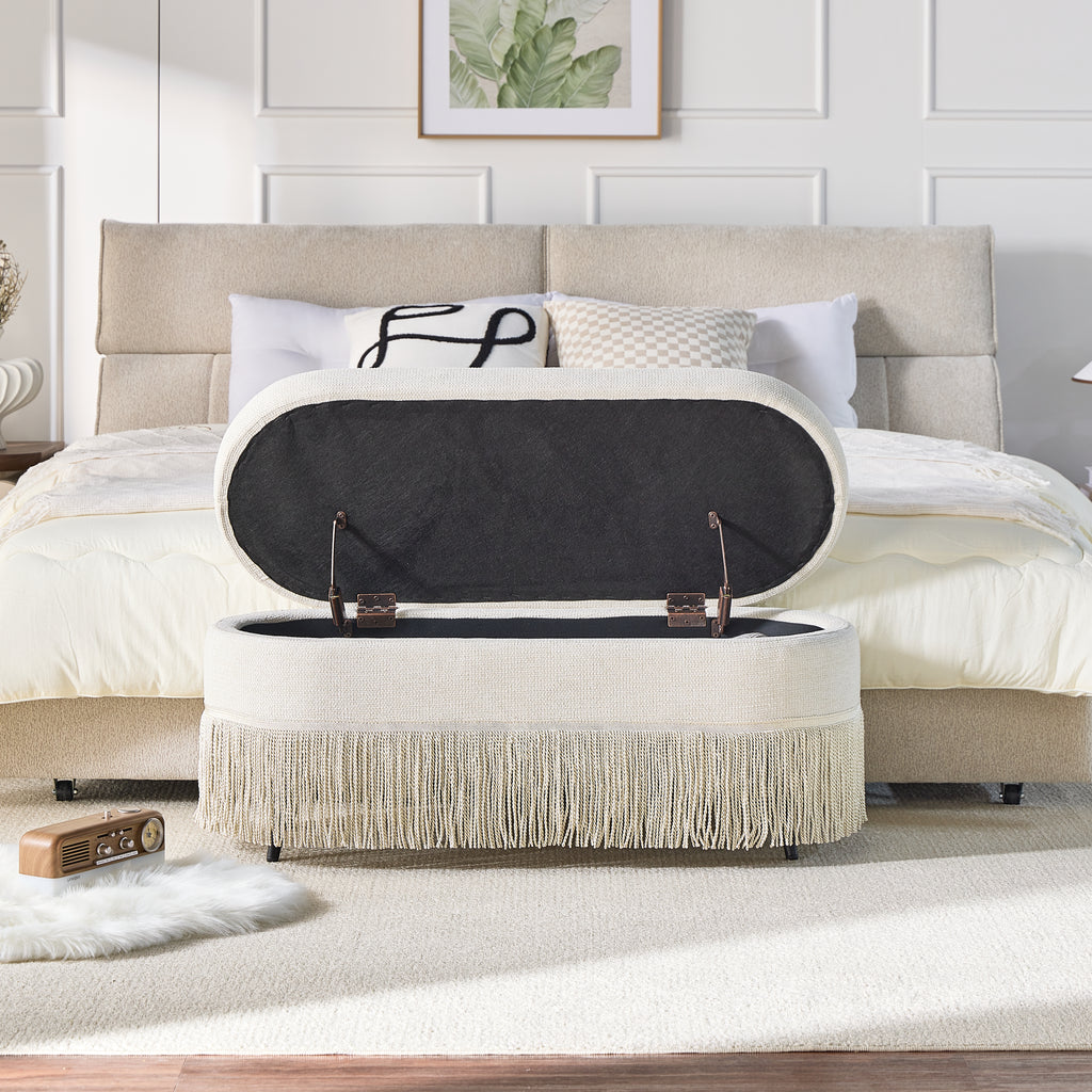 Oval Upholstered Storage Ottoman with Fringe Trim & Lift-Top Lid - 39l X 16w X 17h — product image 1