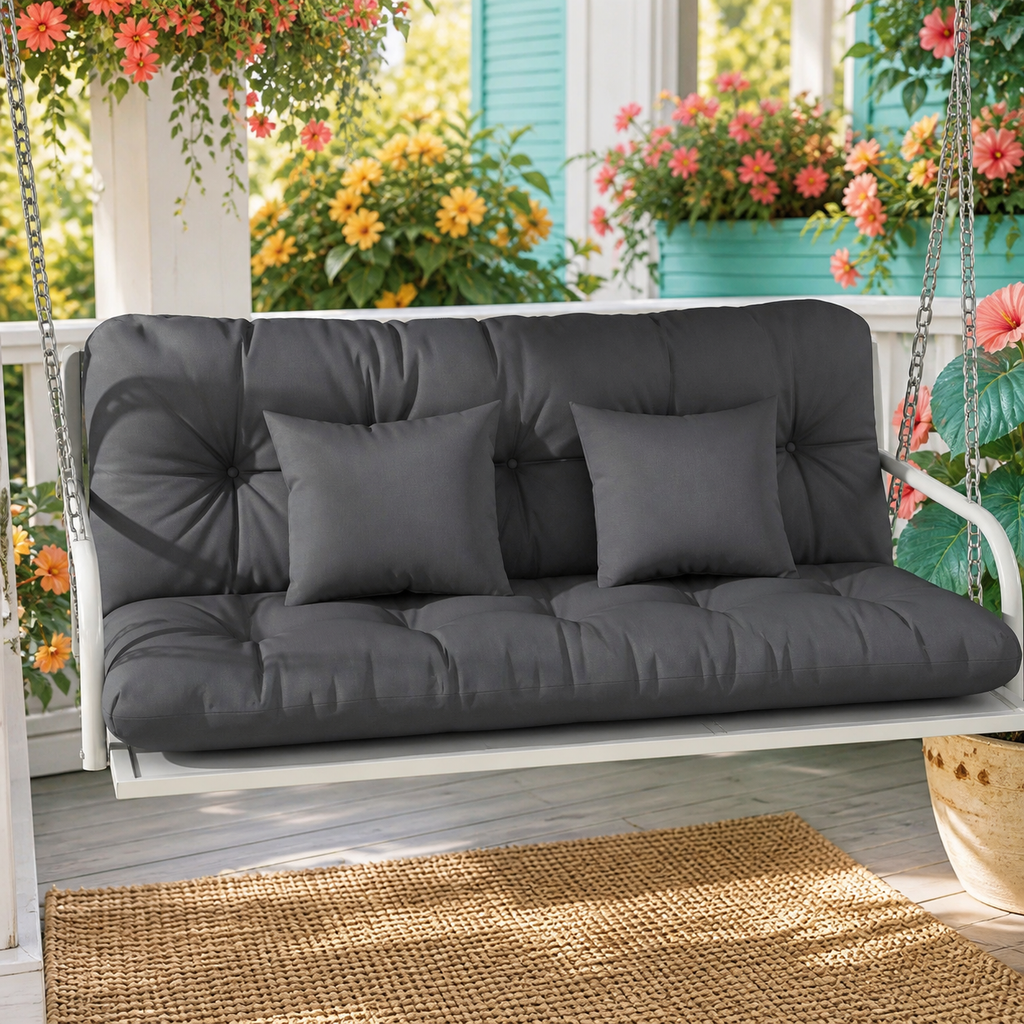 Four-piece charcoal tufted outdoor bench cushion set — vibrant primary lifestyle view