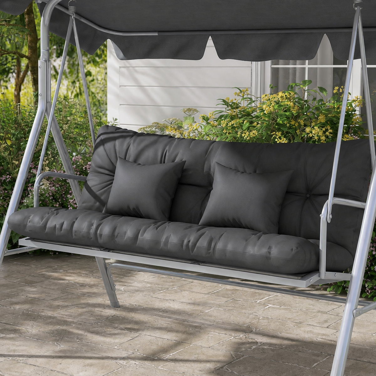 Four-piece charcoal tufted outdoor bench cushion set — complementary lifestyle detail view