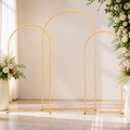 Gold Metal Arch Backdrop Stands — Set of 3 in a colorful realistic setting