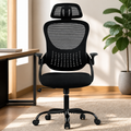 High-Back Ergonomic Mesh Office Chair — Black in a colorful realistic setting