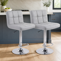 Adjustable Swivel Bar Stools — Set of 2 in a colorful realistic setting