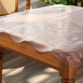 Clear Waterproof Table Protector — 36 × 60 in. in a colorful realistic setting