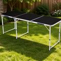 6ft Aluminum Alloy Folding Table Black in a colorful realistic setting